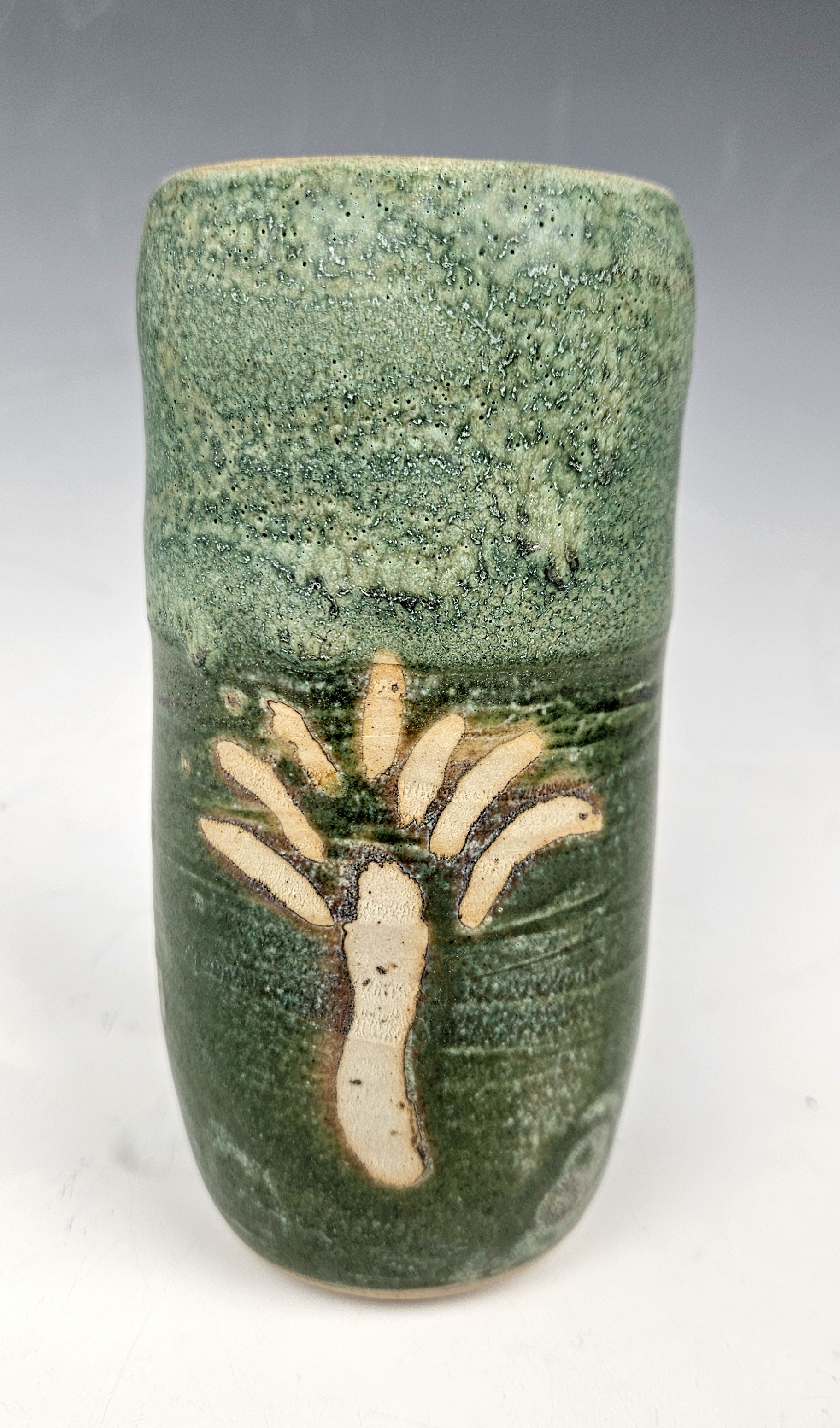 Glaze x over glaze Y - after Cone 10 firing