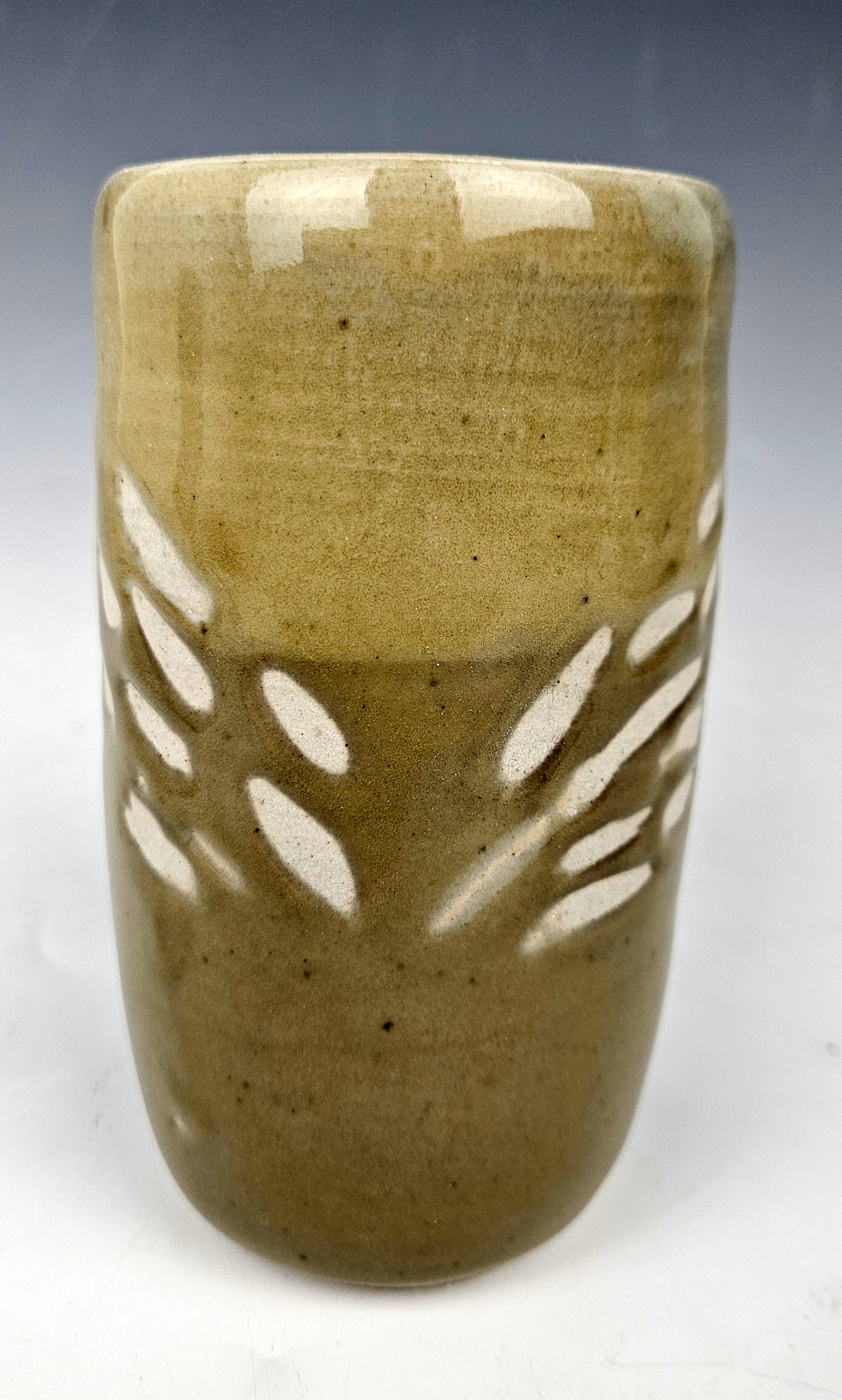 Glaze x over glaze Y - after Cone 10 firing